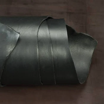 Close-up of thick latigo leather used to build THE ALPHA dog collar