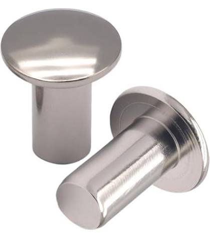 Close-up of solid-body aircraft aluminum rivets used in THE ALPHA leather dog collar